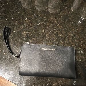 Michael Kors black wristlet with cell phone pocket